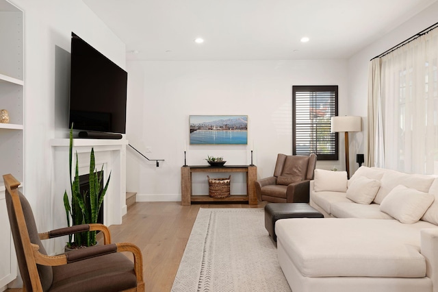 3736 State St Unit 109, Santa Barbara, CA 93105 - living room with wood finished floors, recessed lighting, and baseboards