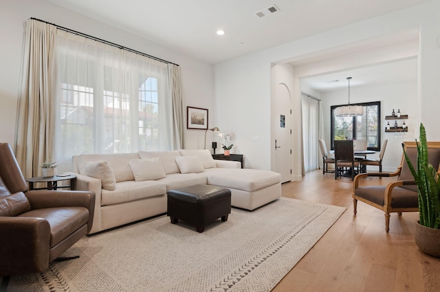 3736 State St Unit 109, Santa Barbara, CA 93105 - living area featuring recessed lighting, light wood-type flooring, and a chandelier