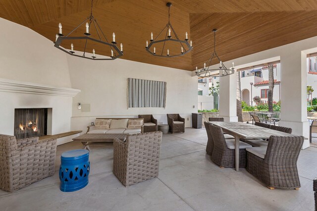 3736 State St Unit 109, Santa Barbara, CA 93105 - view of patio / terrace with outdoor dining space and an outdoor living space with a fireplace