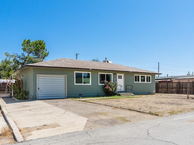 4810 Cebrian Ave, New Cuyama, CA 93254 - ranch-style house featuring an attached garage, crawl space, and driveway