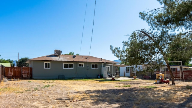4810 Cebrian Ave, New Cuyama, CA 93254 - back of house with a playground