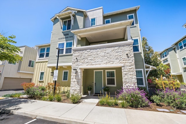 5696 Surfrider Way Unit 101, Goleta, CA 93117 - multi unit property featuring stone siding and board and batten siding