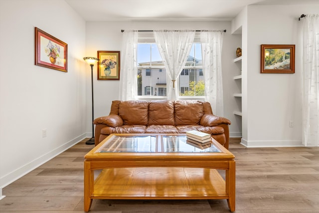 5696 Surfrider Way Unit 101, Goleta, CA 93117 - living area with light wood finished floors and baseboards
