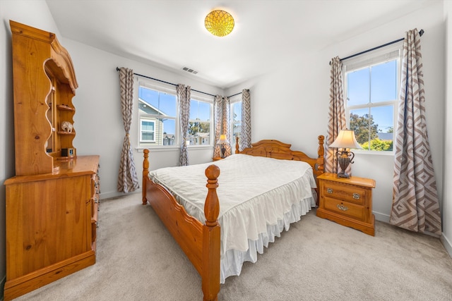 5696 Surfrider Way Unit 101, Goleta, CA 93117 - bedroom with light colored carpet and baseboards