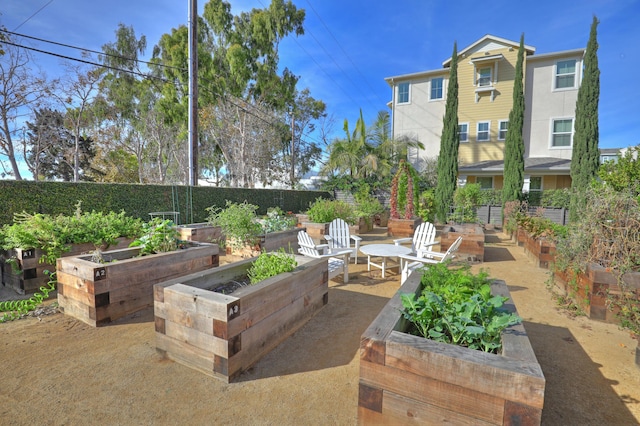5696 Surfrider Way Unit 101, Goleta, CA 93117 - view of patio with a vegetable garden