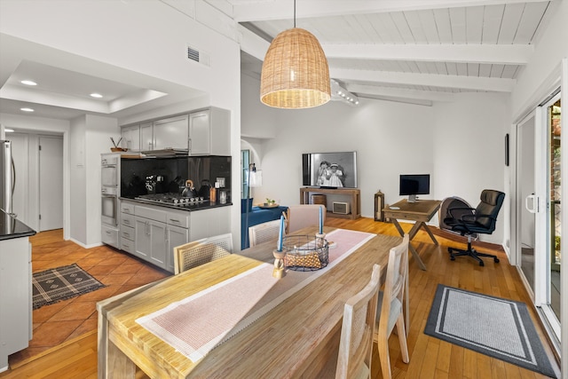 2648 State St Unit 32, Santa Barbara, CA 93105 - dining area featuring a desk, light wood finished floors, wooden ceiling with exposed beams, and recessed lighting