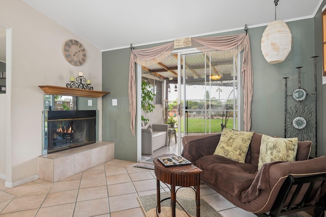 5671 Cathedral Oaks Rd, Goleta, CA 93117 - living room with a tile fireplace, ornamental molding, and tile patterned flooring