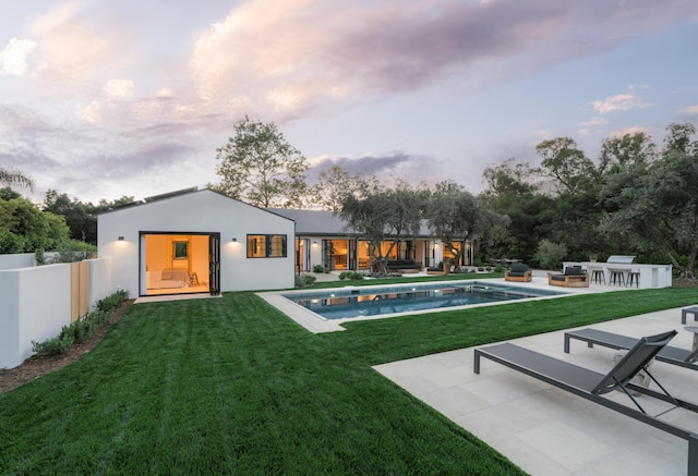 99 Sierra Vista Rd, Santa Barbara, CA 93108 - back of property featuring a patio area, a yard, an outdoor pool, stucco siding, and an outdoor living space