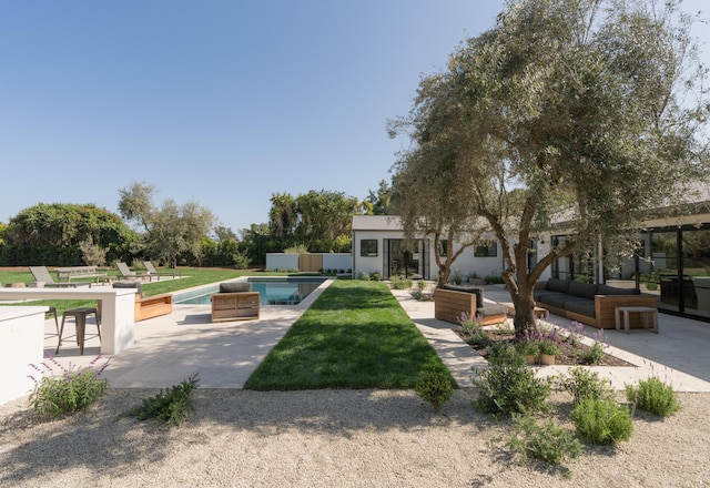 99 Sierra Vista Rd, Santa Barbara, CA 93108 - view of property's community featuring outdoor lounge area, a patio, a lawn, and a pool