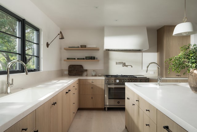 99 Sierra Vista Rd, Santa Barbara, CA 93108 - kitchen with extractor fan, a sink, light brown cabinetry, and light countertops