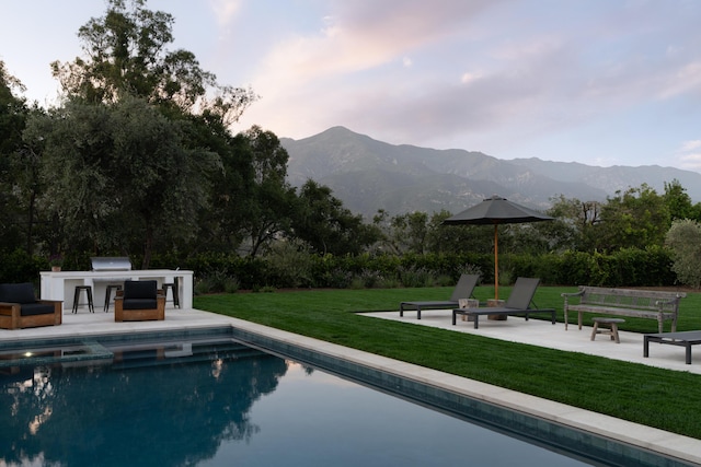99 Sierra Vista Rd, Santa Barbara, CA 93108 - view of swimming pool with a mountain view, an outdoor kitchen, a yard, and a patio area