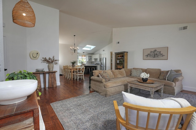 227 Menlo Dr, Buellton, CA 93427 - living room featuring dark wood-style flooring, a chandelier, a skylight, high vaulted ceiling, and baseboards