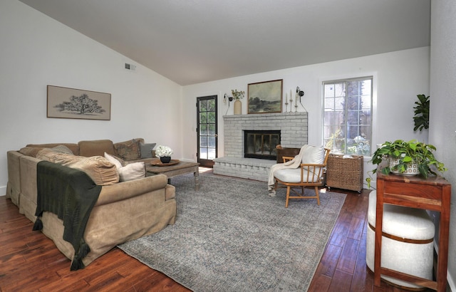 227 Menlo Dr, Buellton, CA 93427 - living area with lofted ceiling, dark wood-type flooring, and a fireplace