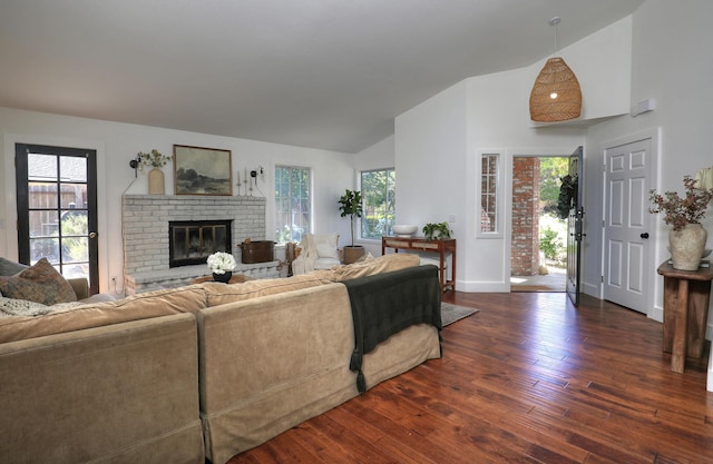 227 Menlo Dr, Buellton, CA 93427 - living area featuring baseboards, dark wood-type flooring, high vaulted ceiling, plenty of natural light, and a brick fireplace