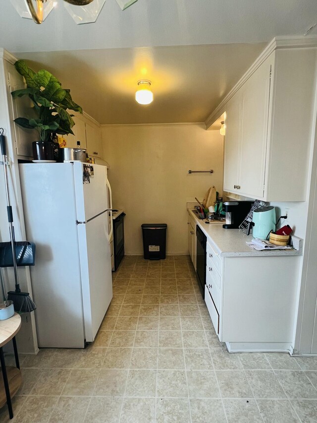 459 Linfield Pl, Goleta, CA 93117 - kitchen featuring freestanding refrigerator, light countertops, dishwasher, white cabinetry, and electric range oven