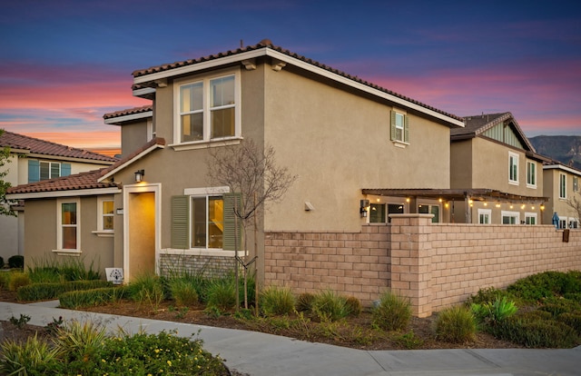 1926 Pump House Ln, Santa Paula, CA 93060 - view of front of home with stucco siding and a tiled roof