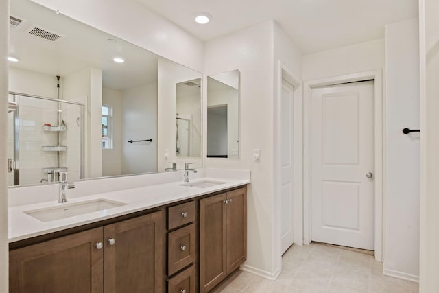 1926 Pump House Ln, Santa Paula, CA 93060 - bathroom featuring baseboards, double vanity, a stall shower, and tile patterned floors