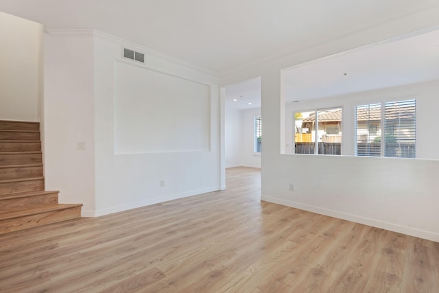 598 Poppyfield Pl, Goleta, CA 93117 - spare room featuring light wood-type flooring, stairway, baseboards, and crown molding