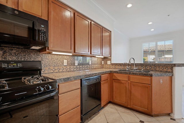 598 Poppyfield Pl, Goleta, CA 93117 - kitchen featuring black appliances, a sink, a peninsula, tasteful backsplash, and recessed lighting