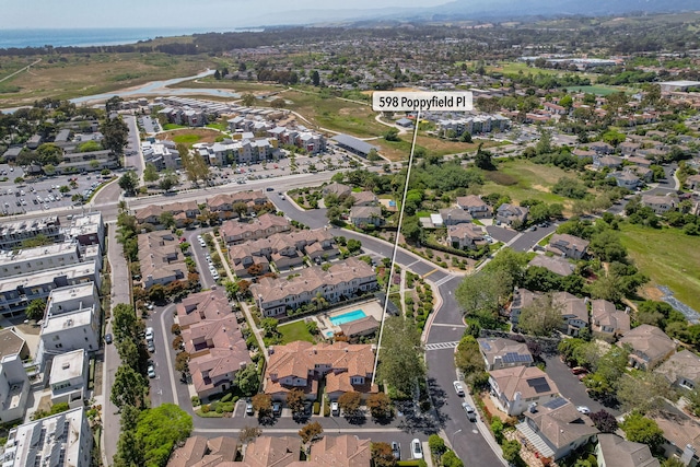 598 Poppyfield Pl, Goleta, CA 93117 - aerial overview of property's location with a nearby body of water and nearby suburban area