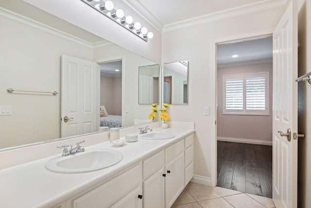 4538 Marrisa Way, Camarillo, CA 93012 - ensuite bathroom with double vanity, crown molding, baseboards, and tile patterned flooring