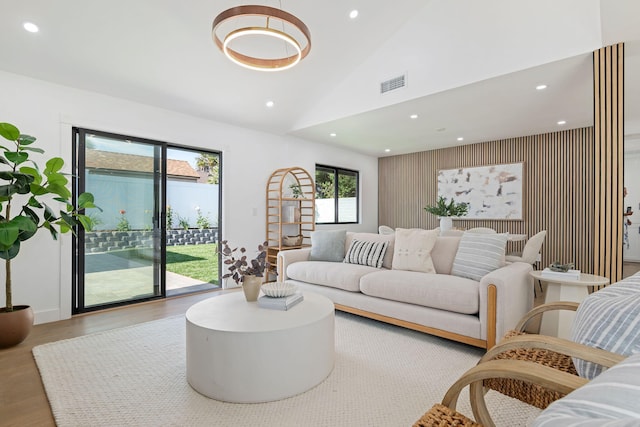 7352 Elmhurst Pl, Goleta, CA 93117 - living room featuring recessed lighting, wood finished floors, and vaulted ceiling