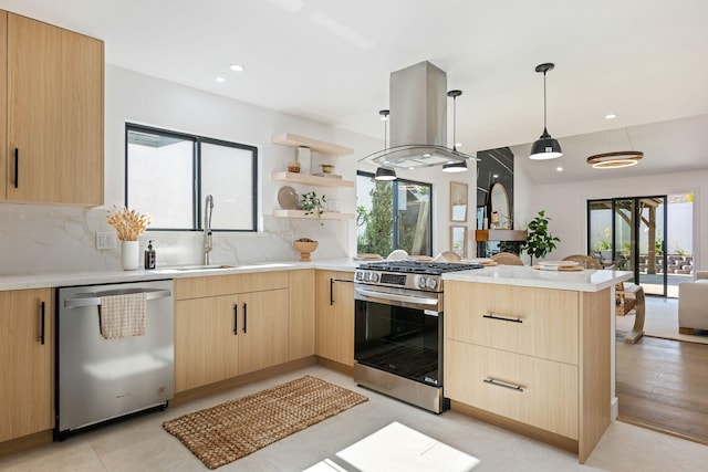 7352 Elmhurst Pl, Goleta, CA 93117 - kitchen with appliances with stainless steel finishes, light brown cabinets, island range hood, a sink, and a peninsula
