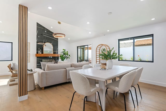 7352 Elmhurst Pl, Goleta, CA 93117 - dining room featuring lofted ceiling, light wood-style flooring, recessed lighting, and baseboards