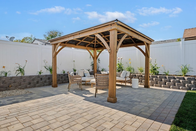 7352 Elmhurst Pl, Goleta, CA 93117 - fenced backyard with a patio area, a gazebo, and an outdoor living space
