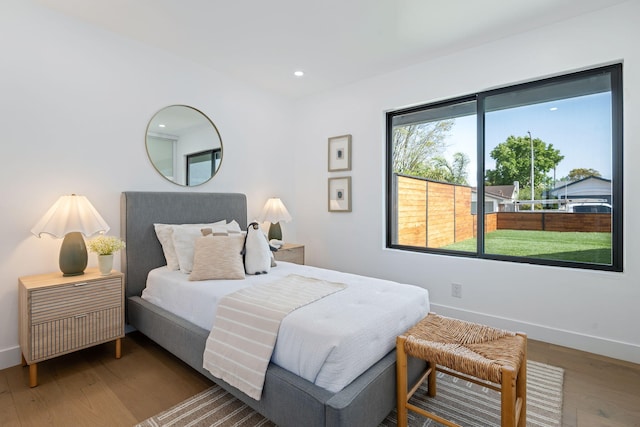 7352 Elmhurst Pl, Goleta, CA 93117 - bedroom featuring baseboards, wood finished floors, and recessed lighting