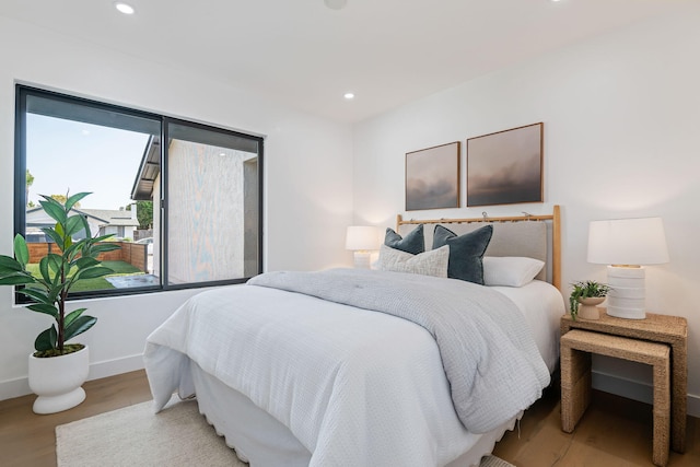7352 Elmhurst Pl, Goleta, CA 93117 - bedroom with wood finished floors, recessed lighting, and baseboards