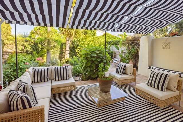 924 Garden St Unit F, Santa Barbara, CA 93101 - view of patio with an outdoor living space and a pergola