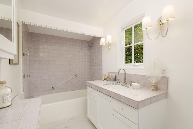 924 Garden St Unit F, Santa Barbara, CA 93101 - full bath with shower / bath combination, vanity, and marble finish floors