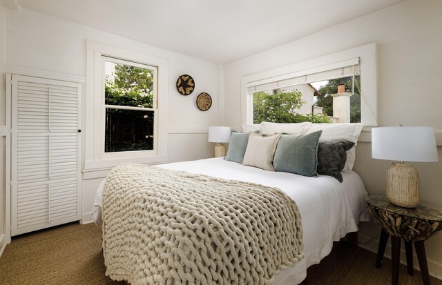 924 Garden St Unit F, Santa Barbara, CA 93101 - carpeted bedroom featuring multiple windows