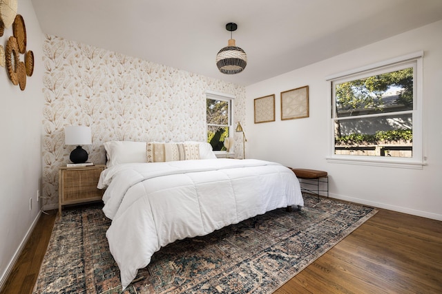 355 Palisades Dr, Santa Barbara, CA 93109 - bedroom with wood finished floors, baseboards, and multiple windows