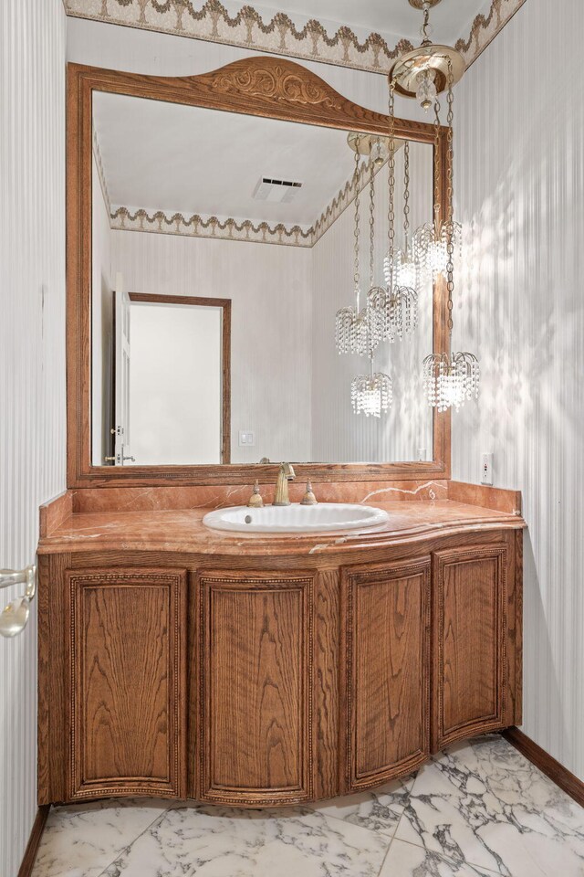5287 N Creston Ln, Somis, CA 93066 - bathroom featuring marble look tile flooring, vanity, and wallpapered walls