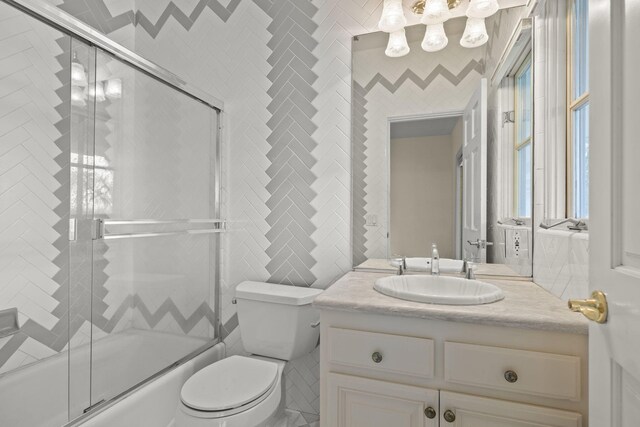 5287 N Creston Ln, Somis, CA 93066 - full bath with enclosed tub / shower combo, toilet, vanity, and tile walls