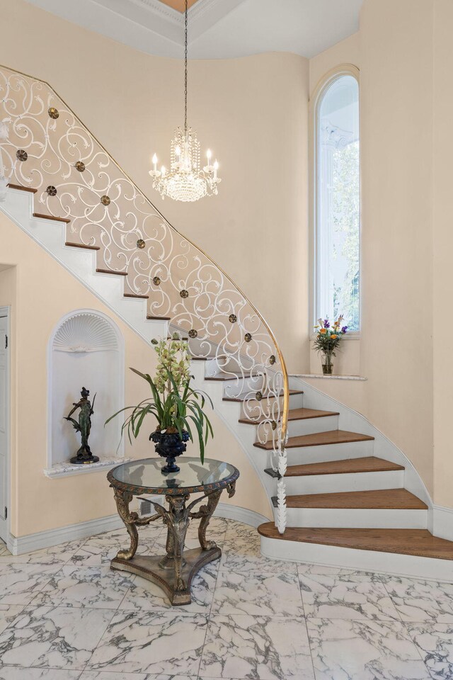 5287 N Creston Ln, Somis, CA 93066 - foyer entrance with stairs, marble finish floors, baseboards, and a chandelier
