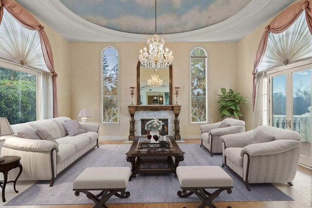 5287 N Creston Ln, Somis, CA 93066 - living area with a chandelier, wood finished floors, a raised ceiling, and baseboards