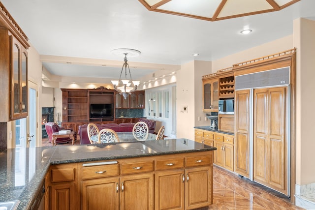 5287 N Creston Ln, Somis, CA 93066 - kitchen with paneled fridge, stainless steel microwave, decorative backsplash, glass insert cabinets, and recessed lighting