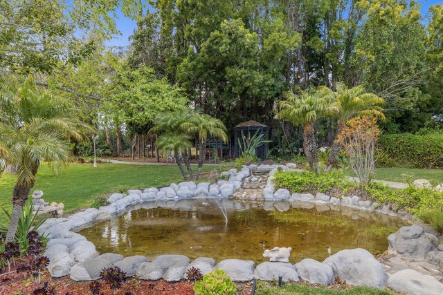 5287 N Creston Ln, Somis, CA 93066 - view of home's community featuring a lawn, a garden pond, and view of wooded area