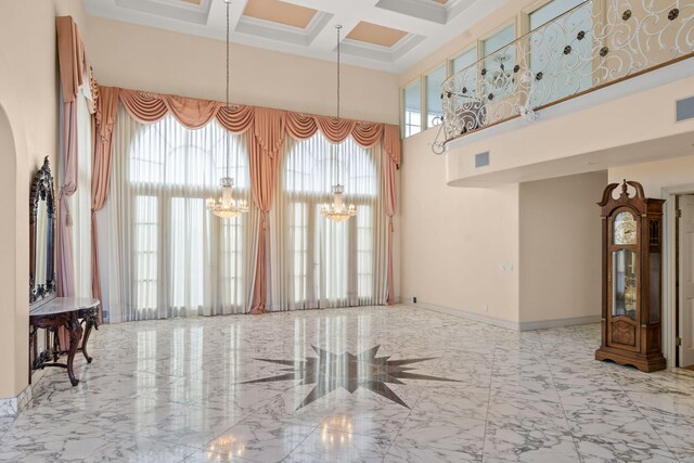 5287 N Creston Ln, Somis, CA 93066 - unfurnished room featuring a towering ceiling, plenty of natural light, a chandelier, coffered ceiling, and arched walkways