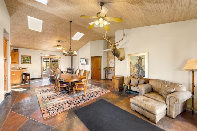 13750 Cuyama Hwy, Cuyama, CA 93461 - dining area with a ceiling fan, a skylight, wood ceiling, vaulted ceiling, and baseboards