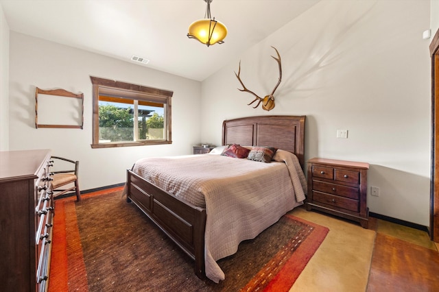 13750 Cuyama Hwy, Cuyama, CA 93461 - bedroom with baseboards, wood finished floors, and vaulted ceiling