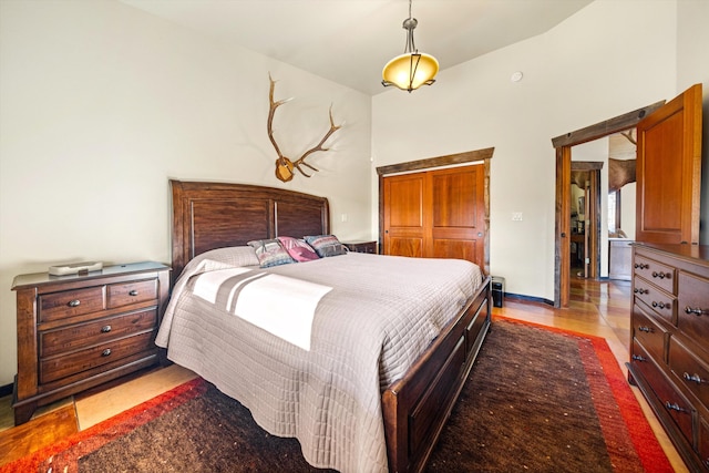 13750 Cuyama Hwy, Cuyama, CA 93461 - bedroom with baseboards and light wood-style flooring