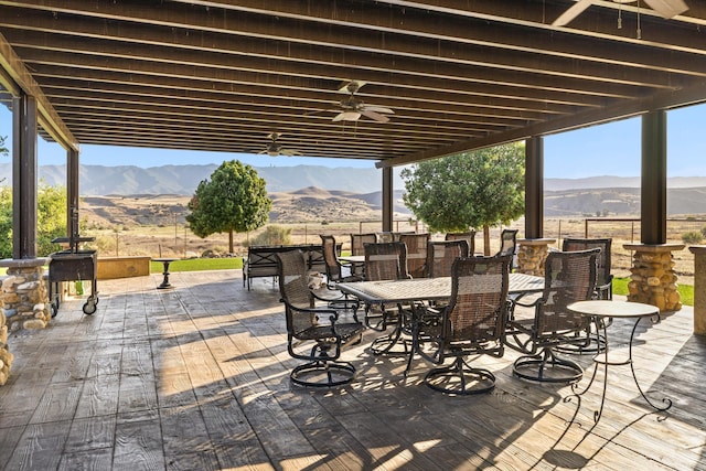 13750 Cuyama Hwy, Cuyama, CA 93461 - view of patio / terrace featuring a ceiling fan, a mountain view, and outdoor dining area