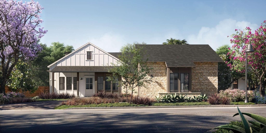 123 Polo Way, Santa Barbara, CA 93013 - view of front of property with stone siding, board and batten siding, and roof with shingles