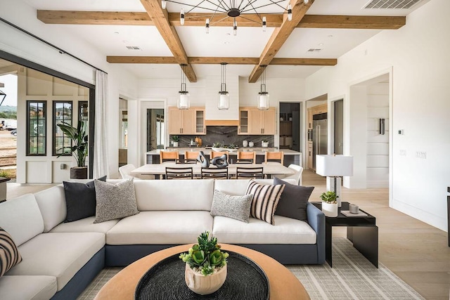 123 Polo Way, Santa Barbara, CA 93013 - living area featuring light wood-type flooring, coffered ceiling, and beamed ceiling