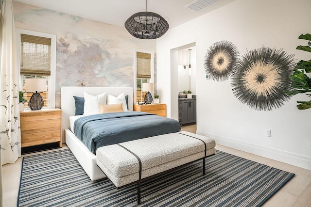 123 Polo Way, Santa Barbara, CA 93013 - bedroom with a chandelier and ensuite bath