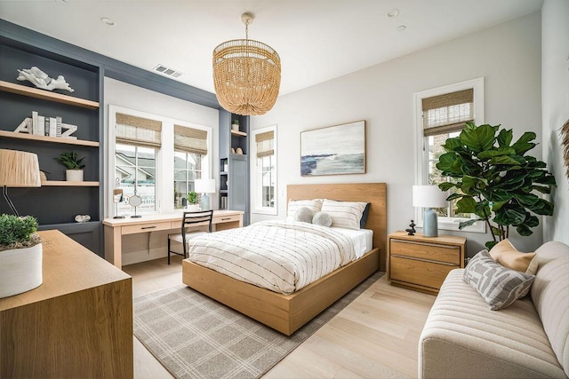 123 Polo Way, Santa Barbara, CA 93013 - bedroom featuring a chandelier and light wood-style flooring